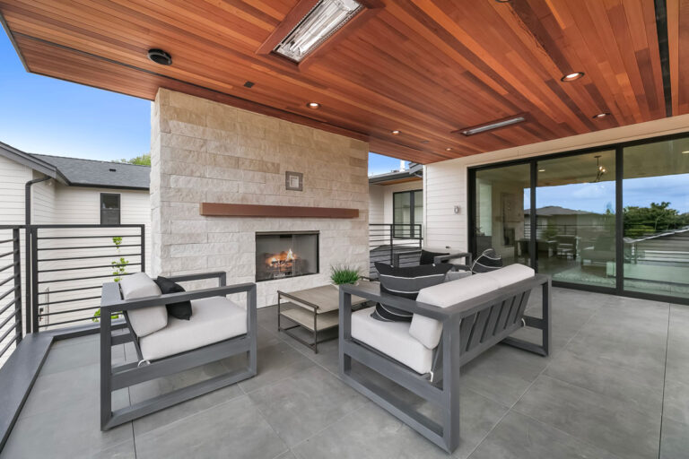 Arabella custom floor plan primary suite covered deck with gas fireplace
