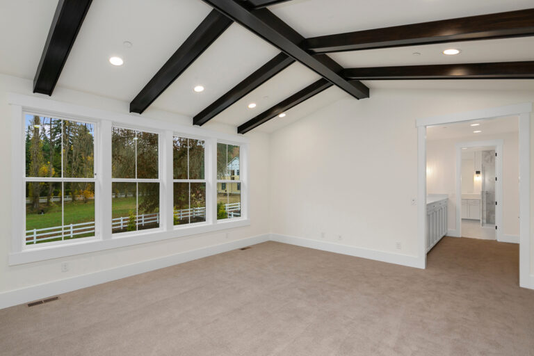 Barbaro custom floor plan primary suite with vaulted ceiling