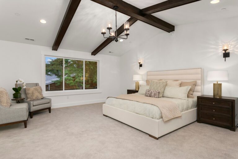 Belmont custom floor plan primary suite with vaulted ceiling
