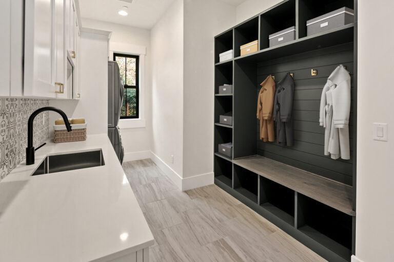 Birch custom floor plan mudroom with washer and dryer